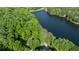 Scenic aerial view of 815 Marshview Close, showcasing its lakefront location and abundant greenery at 815 Marshview Close, Roswell, GA 30076
