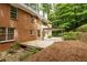 Inviting backyard deck perfect for entertaining, featuring lush landscaping and a charming pergola at 815 Marshview Close, Roswell, GA 30076