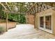 Backyard deck and pergola are perfect for outdoor living, with French doors leading inside at 815 Marshview Close, Roswell, GA 30076