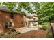 Backyard wooden deck and brick patio at 815 Marshview Close, Roswell, GA 30076