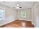 This bedroom offers hardwood floors and natural light from two windows at 1653 Terry Mill Se Rd, Atlanta, GA 30316