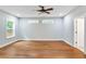 Spacious bedroom featuring hardwood floors, recessed lighting, and natural light from two windows at 1653 Terry Mill Se Rd, Atlanta, GA 30316