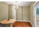 A cozy breakfast nook with an adjacent outdoor deck and featuring hardwood floors and natural light at 1653 Terry Mill Se Rd, Atlanta, GA 30316