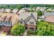 Lovely home features manicured lawn, inviting front porch, and stylish design elements at 1741 Hickory Path Way, Suwanee, GA 30024
