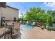 Relaxing outdoor deck perfect for entertaining with string lights at 1741 Hickory Path Way, Suwanee, GA 30024