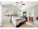 Cozy bedroom with ensuite bathroom and plenty of natural light at 1741 Hickory Path Way, Suwanee, GA 30024