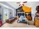 Fun bedroom with two beds and custom wall mural with space theme at 1741 Hickory Path Way, Suwanee, GA 30024
