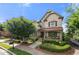 Charming two-story home with a beautifully landscaped front yard and inviting front porch at 1741 Hickory Path Way, Suwanee, GA 30024