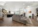 Spacious open-concept living area with hardwood floors and neutral color palette at 1741 Hickory Path Way, Suwanee, GA 30024