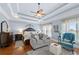 Spacious main bedroom with tray ceilings and ample natural light at 1741 Hickory Path Way, Suwanee, GA 30024