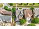 Aerial view of backyard with deck, mature trees, and well-maintained landscaping at 1741 Hickory Path Way, Suwanee, GA 30024