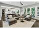 Expansive living room with an open floor plan and access to the backyard, perfect for entertaining at 2460 Drew Valley Ne Rd, Brookhaven, GA 30319