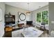 Stylish home office with a large window, modern desk, and ample storage space at 2460 Drew Valley Ne Rd, Brookhaven, GA 30319