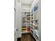 Well-organized pantry with custom shelving and ample storage space for food and kitchen essentials at 2460 Drew Valley Ne Rd, Brookhaven, GA 30319