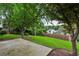 Lush backyard featuring green grass and mature trees at 4710 Vineyard Se Ct, Smyrna, GA 30082