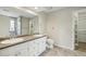 Spacious bathroom features dual sinks and modern fixtures with a separate toilet at 4710 Vineyard Se Ct, Smyrna, GA 30082