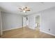 Bright bedroom with hardwood flooring, ceiling fan and an ensuite bathroom at 4710 Vineyard Se Ct, Smyrna, GA 30082