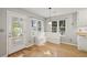 Cozy nook features large windows and storage bench seating with backyard views at 4710 Vineyard Se Ct, Smyrna, GA 30082
