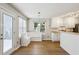 Cozy breakfast nook featuring built-in bench seating and access to the kitchen and back patio at 4710 Vineyard Se Ct, Smyrna, GA 30082