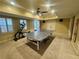 Finished basement featuring a ping pong table, recessed lighting, and a ceiling fan at 703 Overlook Point, Woodstock, GA 30189