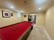 Finished basement with a pool table and recessed lighting at 703 Overlook Point, Woodstock, GA 30189