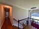 Bright foyer with a chandelier over the stairs at 703 Overlook Point, Woodstock, GA 30189