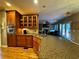 Well-appointed kitchen with a large island, granite countertops, and stainless appliances at 703 Overlook Point, Woodstock, GA 30189