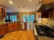 Gourmet kitchen featuring granite countertops and stainless steel appliances at 703 Overlook Point, Woodstock, GA 30189