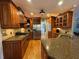 Gourmet kitchen with stainless steel appliances and granite countertops at 703 Overlook Point, Woodstock, GA 30189