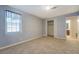 Bedroom with neutral carpet, paint, and closet at 115 Plantation Dr, Clarkston, GA 30021