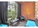 Relaxing balcony with outdoor seating, stylish decor, and lush green view at 1286 Creekside Se Ter, Smyrna, GA 30082
