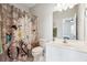 Bathroom with a floral shower curtain and plenty of counter space at 1286 Creekside Se Ter, Smyrna, GA 30082