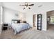 Cozy bedroom with neutral tones and a ceiling fan, creating a relaxing atmosphere at 1286 Creekside Se Ter, Smyrna, GA 30082