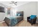 Bedroom with a large bed and a relaxing atmosphere with large windows at 1286 Creekside Se Ter, Smyrna, GA 30082