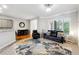 Inviting living room with stylish rug, neutral walls, and comfortable seating arrangement at 1286 Creekside Se Ter, Smyrna, GA 30082