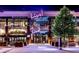 Modern building featuring open-air restaurants and a lively atmosphere at 1286 Creekside Se Ter, Smyrna, GA 30082