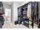 Well-organized walk-in closet with shelves and hanging rods, offering plenty of space at 1286 Creekside Se Ter, Smyrna, GA 30082