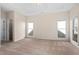 Bright, carpeted bedroom with a ceiling fan and natural light from two windows at 150 Northshore Xing, Dallas, GA 30157