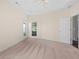 Carpeted bedroom with a ceiling fan and natural light from two windows at 150 Northshore Xing, Dallas, GA 30157