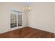 Bright dining room with hardwood floors and a large window at 150 Northshore Xing, Dallas, GA 30157