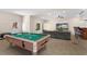 Finished basement with a pool table, bar, and TV area, perfect for entertaining guests at 150 Northshore Xing, Dallas, GA 30157