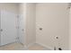 A tidy laundry area, with an exterior door and washer/dryer hookups at 150 Northshore Xing, Dallas, GA 30157
