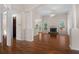Spacious living room with hardwood floors, a fireplace, and archways to other rooms at 150 Northshore Xing, Dallas, GA 30157
