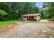 Charming single-story home featuring a cozy front yard and ample parking space at 20 Cheryl Ter, Covington, GA 30016