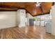 Spacious living room with a wood ceiling, a large window, and wood flooring at 20 Cheryl Ter, Covington, GA 30016