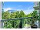 Balcony with a cityscape view, green trees, and a small potted plant at 3300 Windy Ridge Se Pkwy # 809, Atlanta, GA 30339