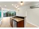 Open kitchen with granite counters, a stainless steel sink, and ample cabinet space, connecting seamlessly to the living area at 3300 Windy Ridge Se Pkwy # 809, Atlanta, GA 30339