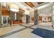 The building's welcoming lobby features a reception desk, stone columns and decorative lighting at 3300 Windy Ridge Se Pkwy # 809, Atlanta, GA 30339