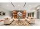 Relaxing lounge area with cozy sofas, built-in shelves, and a large TV at 3300 Windy Ridge Se Pkwy # 809, Atlanta, GA 30339