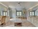 Spacious bathroom with dual vanities, tile flooring and a soaking tub area at 4745 Cuyahoga Cv, Suwanee, GA 30024